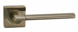 Ручка дверная Капри AB (бронза) на розетке от компании ООО "ДомСпецСервис" - фото 1
