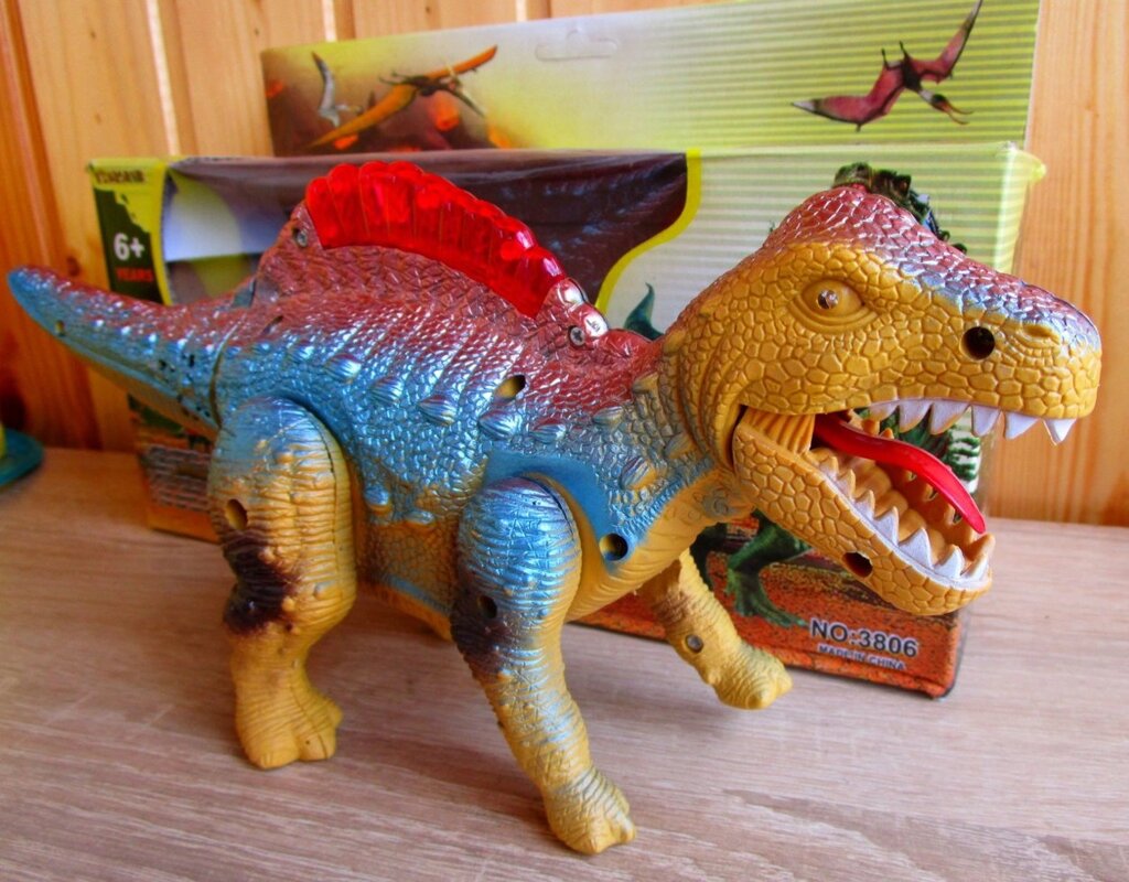 Динозавр (муз. свет. ходит.) 30см от компании Интернет магазин детских игрушек Ny-pogodi. by - фото 1