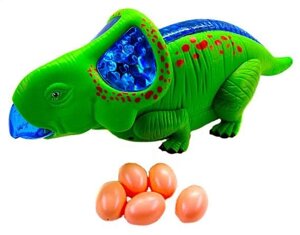 Игрушка муз. динозавр ходит. несет яйца