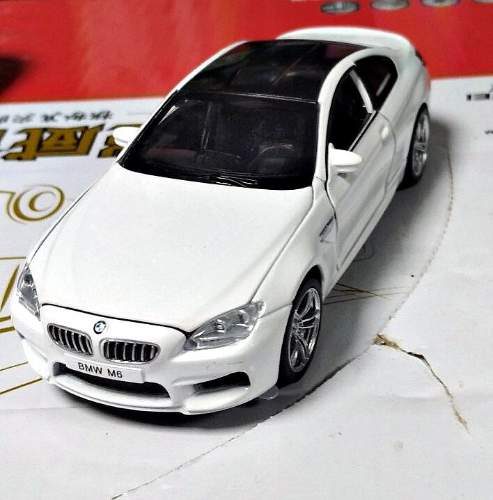 Металлическая  белая машинка BMW М6 Свет звук 16 см от компании Интернет магазин детских игрушек Ny-pogodi. by - фото 1