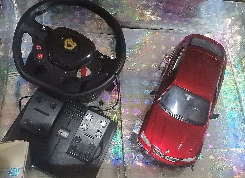 Радиоуправляемая машина бмв BMW X6 на пульте с рулем и педалями от компании Интернет магазин детских игрушек Ny-pogodi. by - фото 1