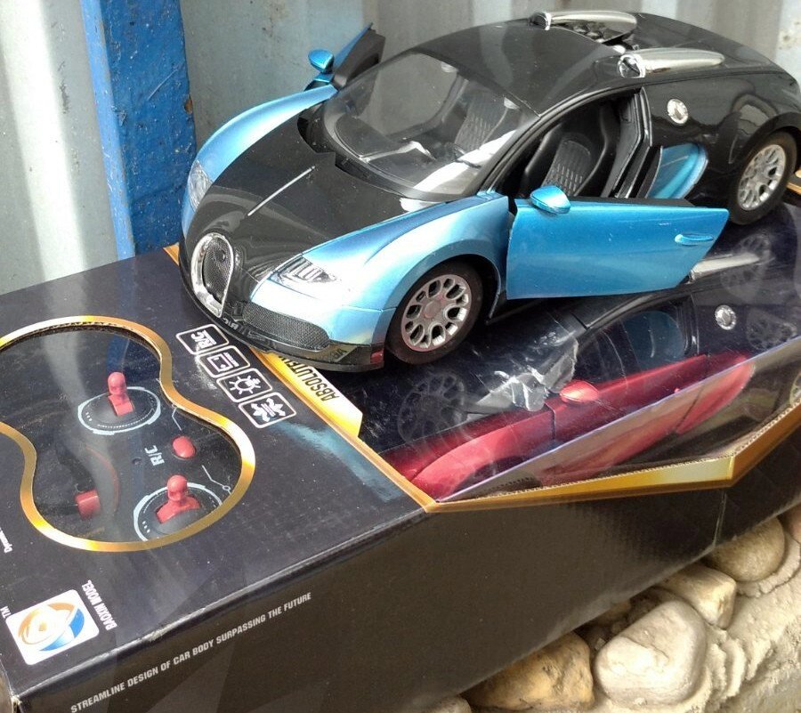 Радиоуправляемая машинка Бугатти Bugatti  аккум. с открывающимися дверями 32 см красная и синяя от компании Интернет магазин детских игрушек Ny-pogodi. by - фото 1