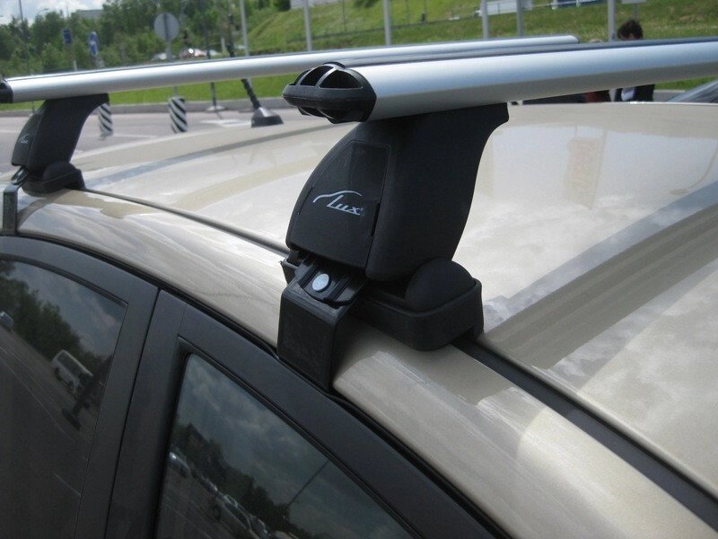Багажник LUX для Kia Rio III, седан, 2011-... (аэродинамическая дуга) от компании ООО «ПЛАРК ТРЭЙД» - фото 1