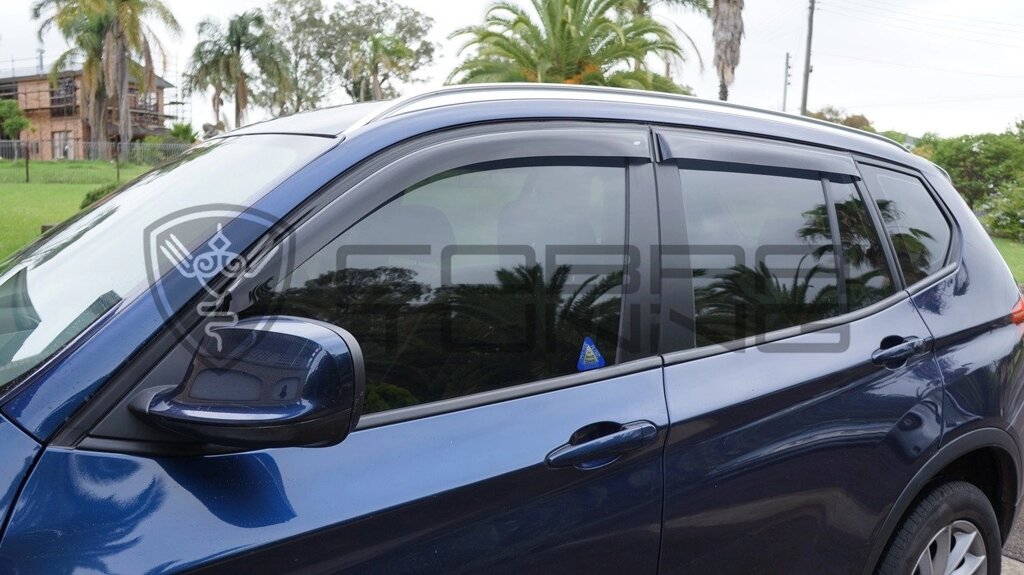 Дефлекторы окон BMW X5 (F15) 2013 Cobra Tuning от компании ООО «ПЛАРК ТРЭЙД» - фото 1