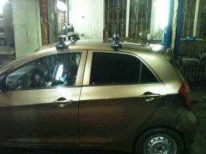 Багажник Атлант для Kia Picanto (5дв) хечбек с 2011г.- (аэродинамическая дуга)