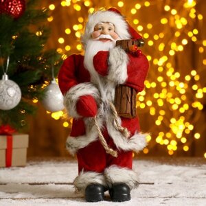 Дед Мороз в красной шубке с брёвнышком 29 см