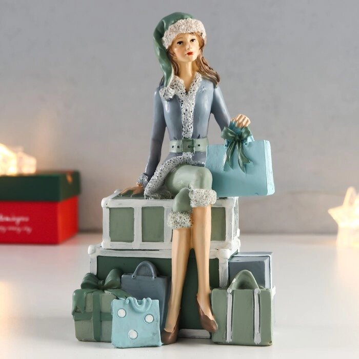 Сувенир полистоун "Девушка в костюме санты на горе подарков" 18х7,5х11 см от компании Интернет-гипермаркет «MOLL» - фото 1