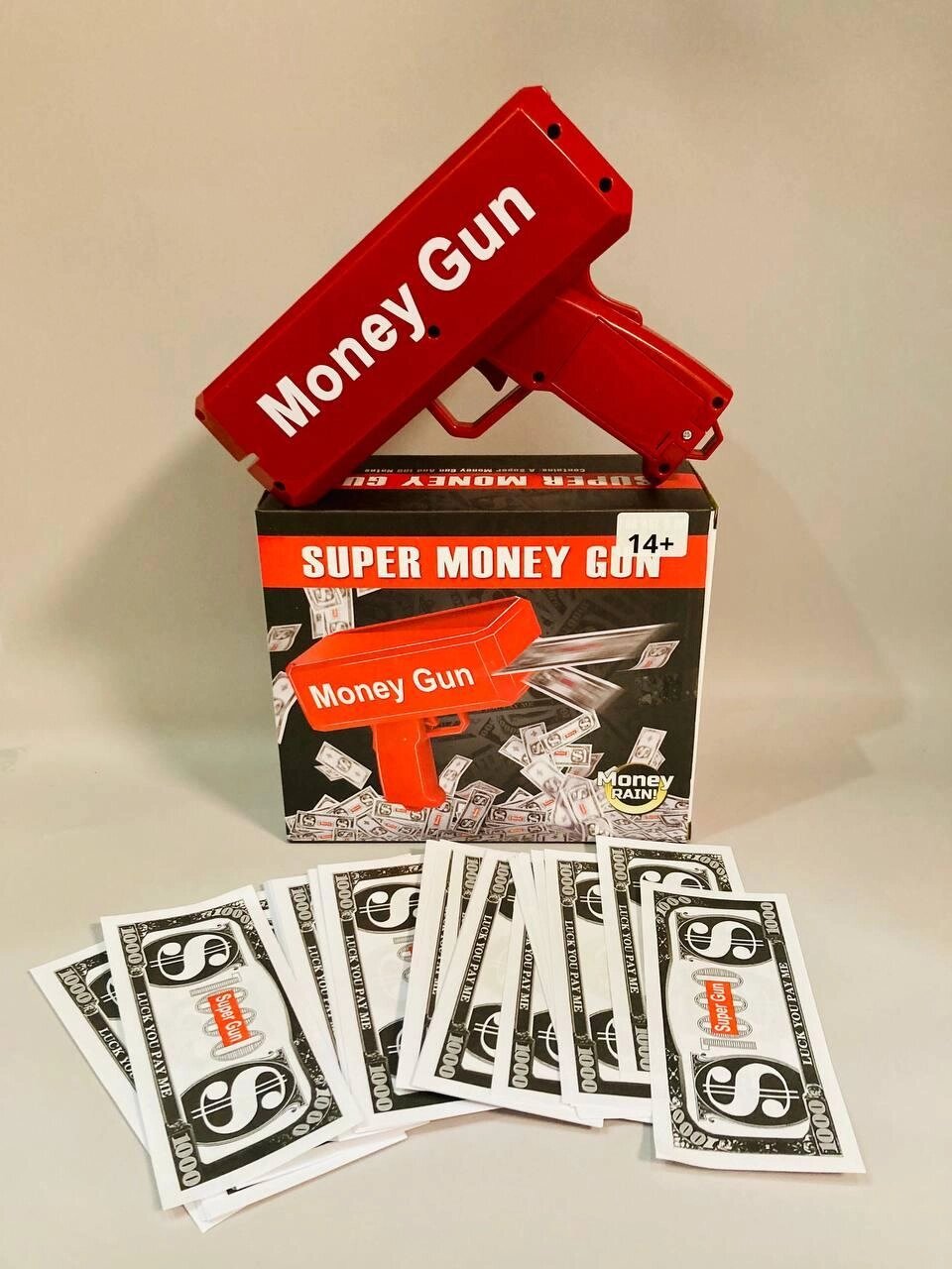 Пистолет стреляющий деньгами Money Gun, деньгомёт от компании ИгрушкиТут - фото 1