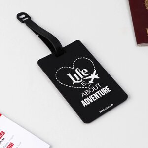 Бирка на чемодан резиновая «Life is about adventure», черная